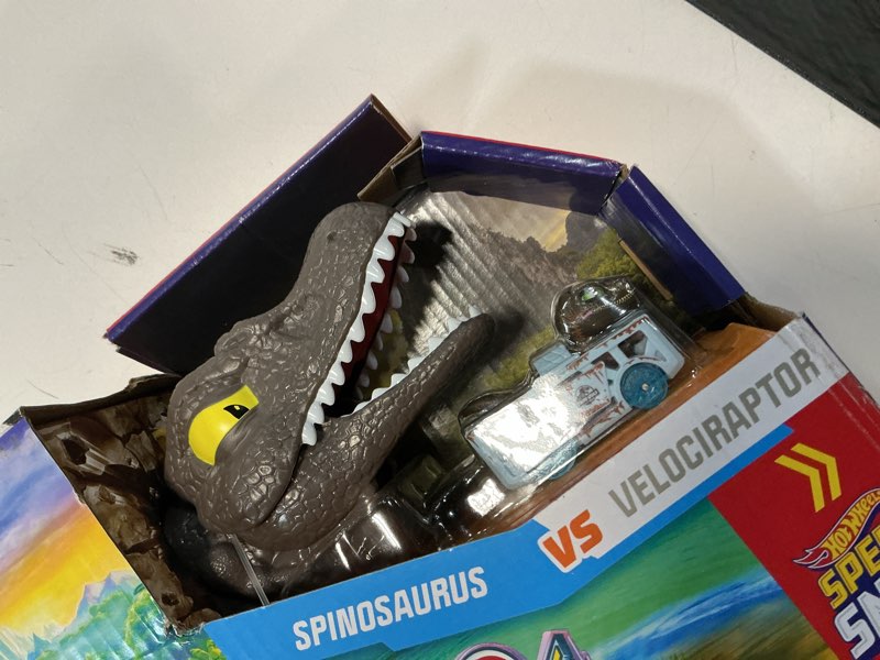 Condition photo showing Good Condition for hot wheels toy car track set, racerverse jurassic world crash & splash playset with die-cast velociraptor vehicle, dinosaur race with spinosaurus