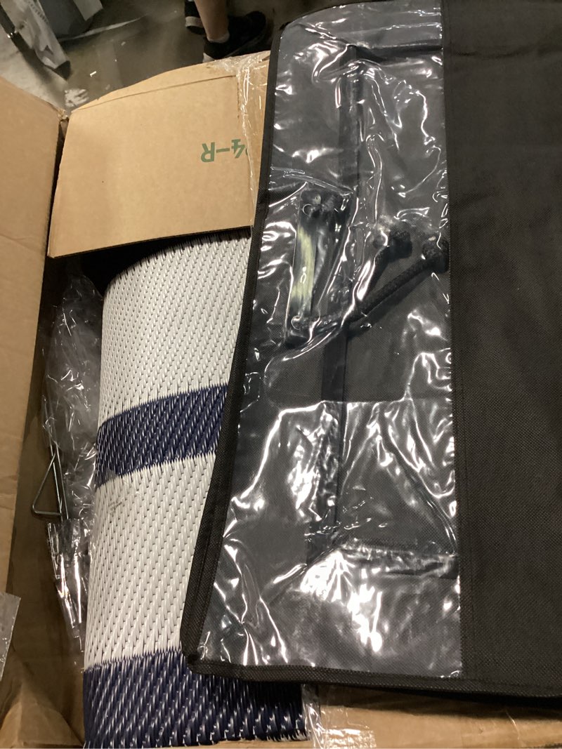 Condition photo showing Good Condition for  tayse luna outdoor rug features a blue and white cabana stripe pattern 