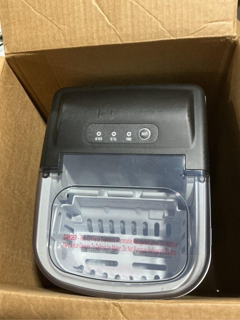 Condition photo showing As Is for EUHOMY Countertop Ice Maker Machine with Handle, 26.5lbs Per Day, 9 Ice Cubes Ready in 6 Mins, Auto-Cleaning Portable Ice Maker with Basket and Scoop, for Home/Kitchen/Camping/RV (Black) Black 26.5lbs