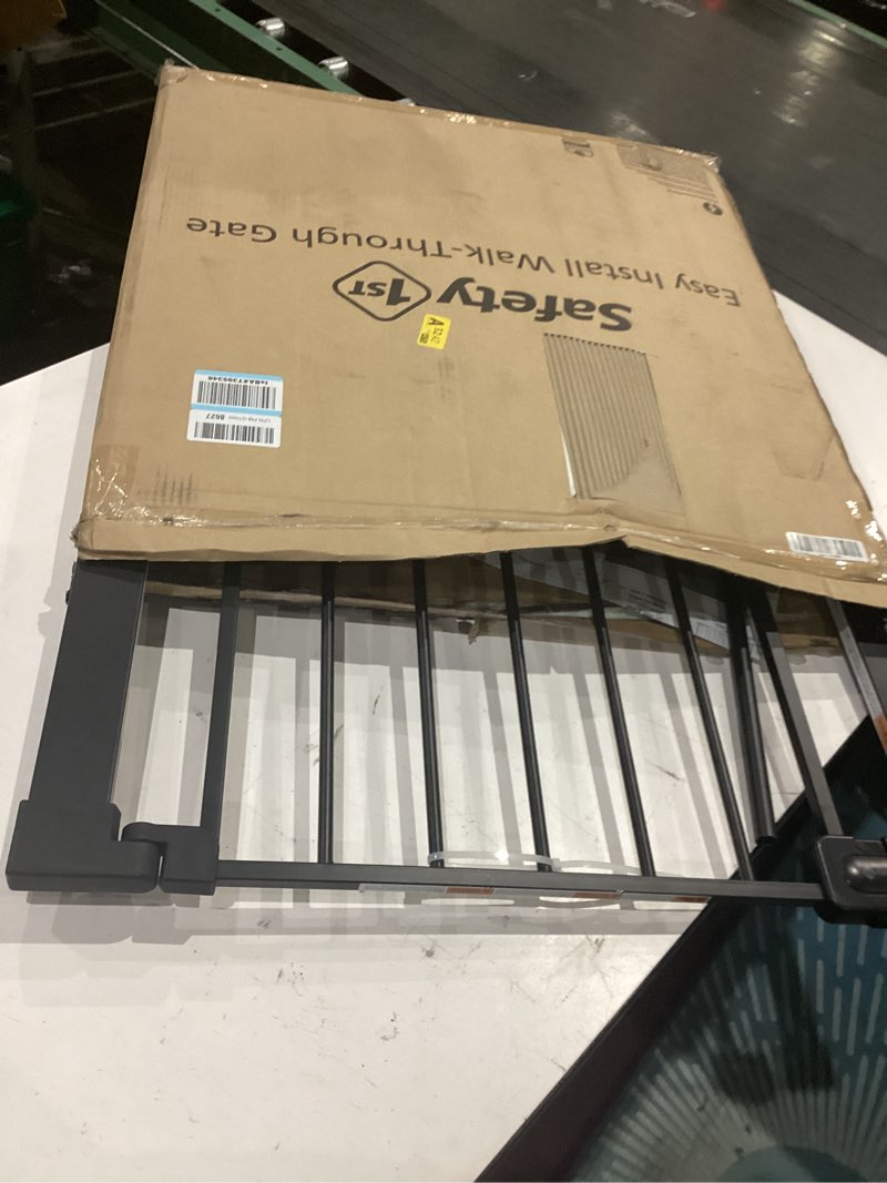 Condition photo showing Good Condition for safety 1st easy install 28'' walk thru gate, fits between 29'' and 38'', black, 1-pack,(ga105cblk) 1-pack 29" to 38" wide x 28" tall black