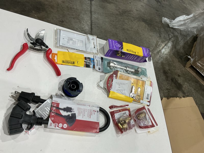 Condition photo showing As Is for assorted home improvement lot (small tools, screw, home accessories, et
