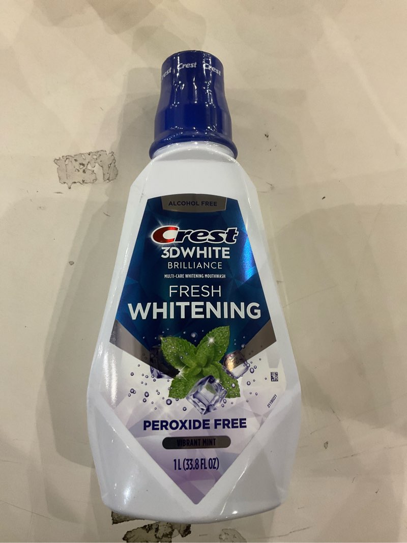 Crest 3D white brilliance multi-care whitening mouthwash fresh whitening peroxide free vibrant mint