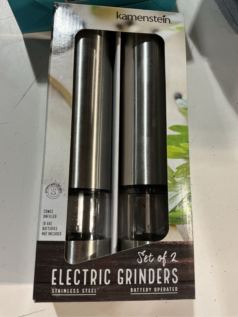 Condition photo showing As Is for kamenstein battery operated stainless steel salt and pepper grinder set of two