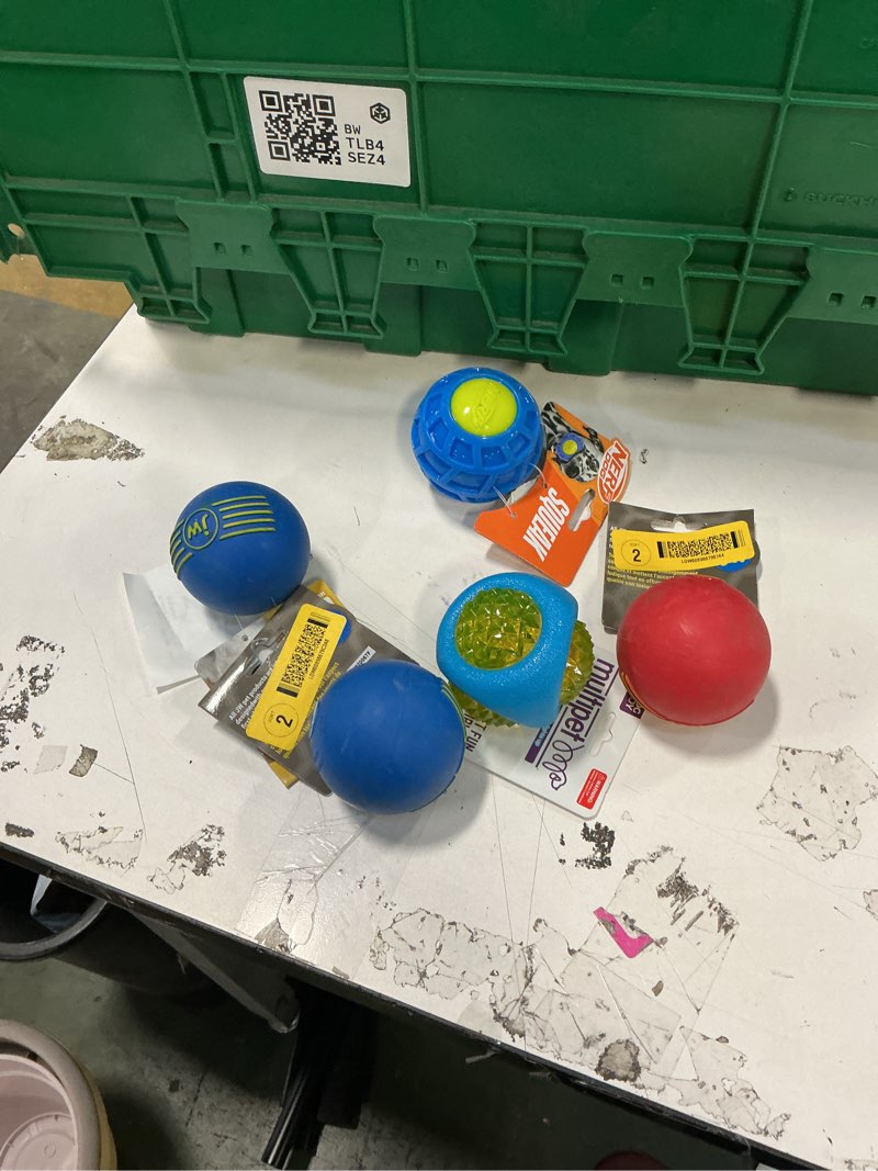 Condition photo showing New/Like New for JW iSqueak Ball Durable Natural Rubber Dog Toy (Assorted Colors) miscellaneous balls