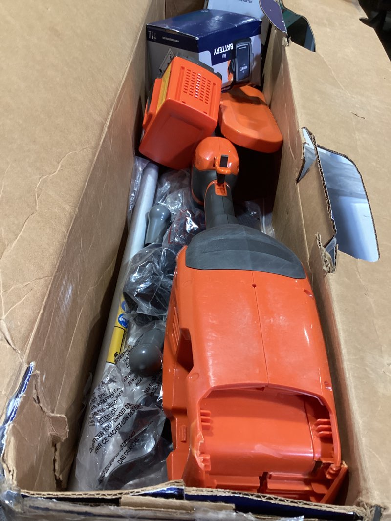 Condition photo showing Good Condition for husqvarna 330ikp combi switch + pole saw attachment, 10-inch electric pole saw with 4 ah battery and charger included, 970701205 chainsaw