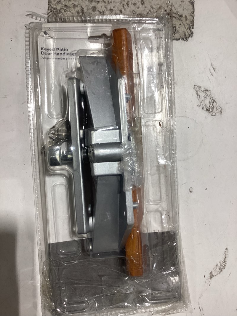 Condition photo showing As Is for reliabilt 3.94-in surface mounted sliding patio door handleset