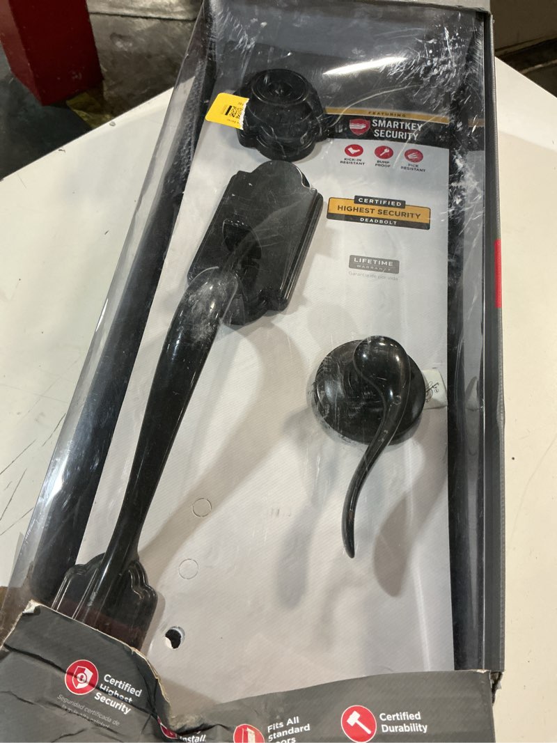 Condition photo showing As Is for kwikset signatures austin venetian bronze smartkey single-cylinder deadbolt entry door handleset tustin