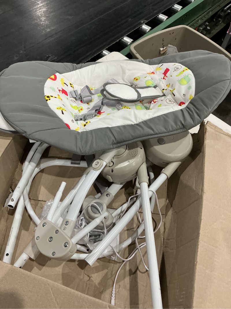 Condition photo showing As Is for zhongshan ccty cironbaby electric baby swing and rocker, white and grey, animal print