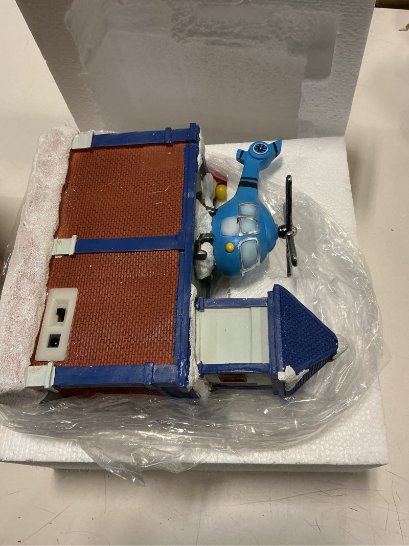 Condition photo showing Good Condition for innodept12 Christmas Animated Train Station Tabletop Décor – Lighted Building with Clock, Music, LED Lights, Moving Train – Christmas Village Indoor Display (Police Station)