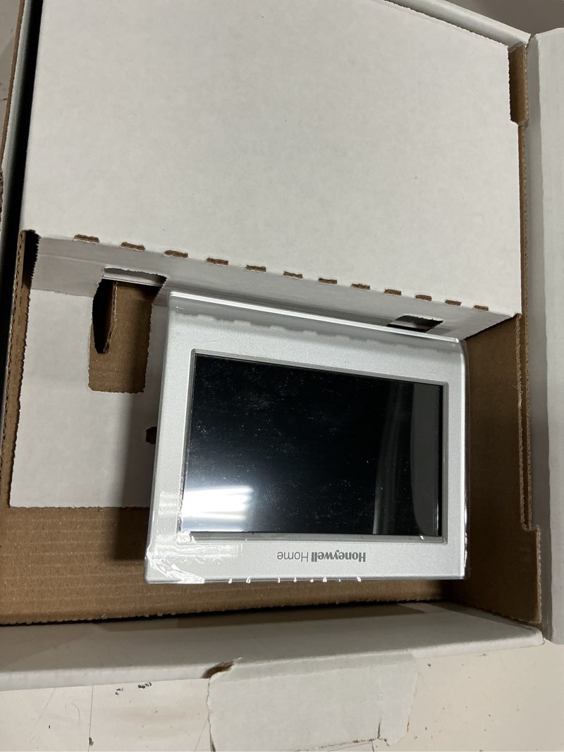 Condition photo showing As Is for honeywell home smart color built in wifi heating and cooling touch screen programmable thermostat