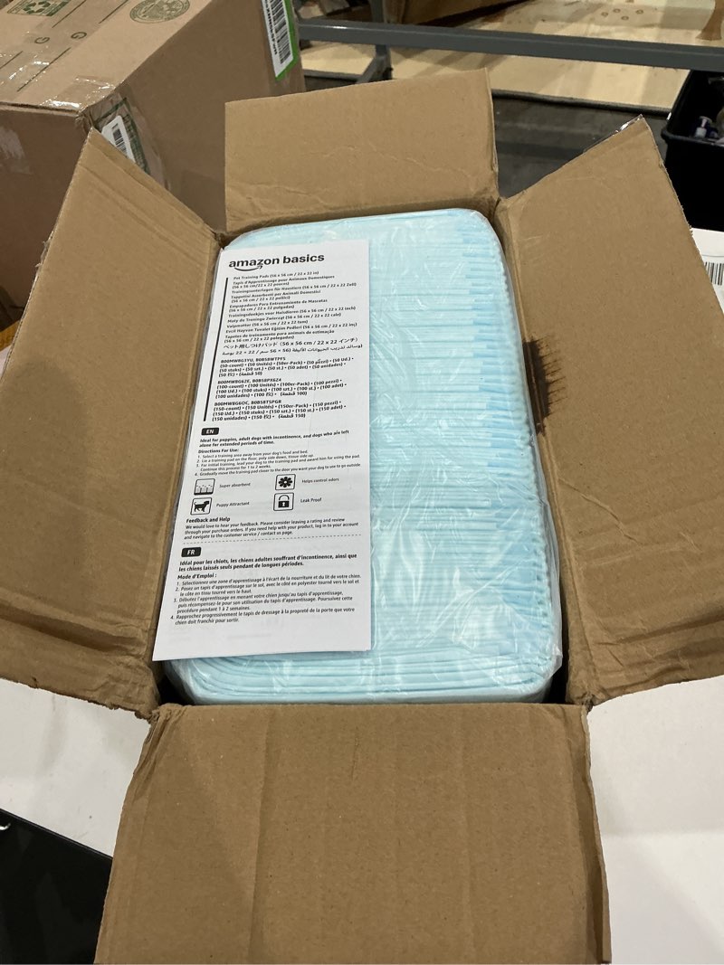 Condition photo showing New/Like New for amazon basics leak-proof dog and puppy potty training pee pads with quick-dry 5-layer super absorbent design, regular size 22 x 22 inch, blue & white, 100 count regular 100 count
