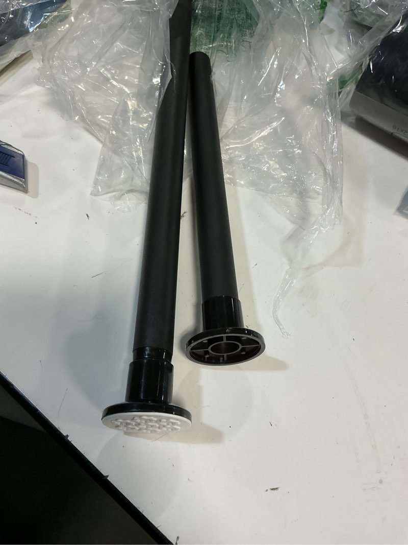 Condition photo showing Good Condition for No Drilling Closet Rod, 27.5-39 Inches Hanging Closet Rod for Clothes, Closet Bar & Pole Heavy-duty, Closet Rods for Hanging Clothes For Closet Wardrobes Bathroom Laundry RV Curtains,Black 27-40 IN Black