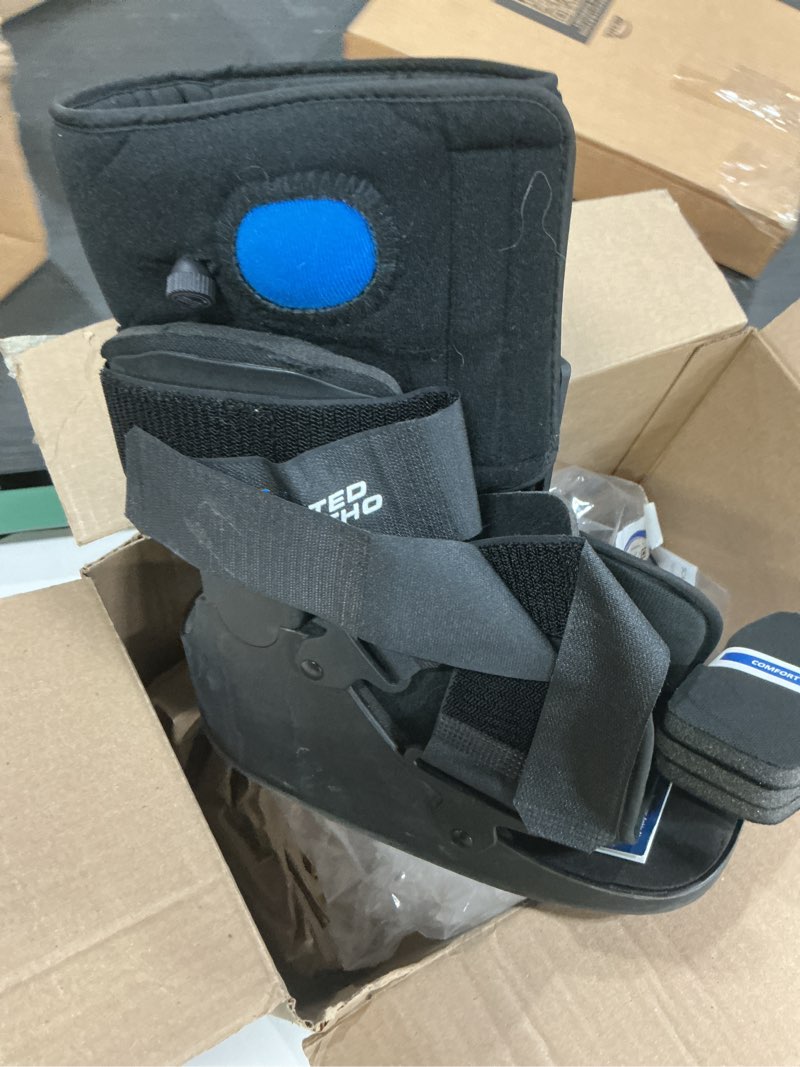 Condition photo showing As Is for united ortho short air cam walker fracture boot, small, black black small boot