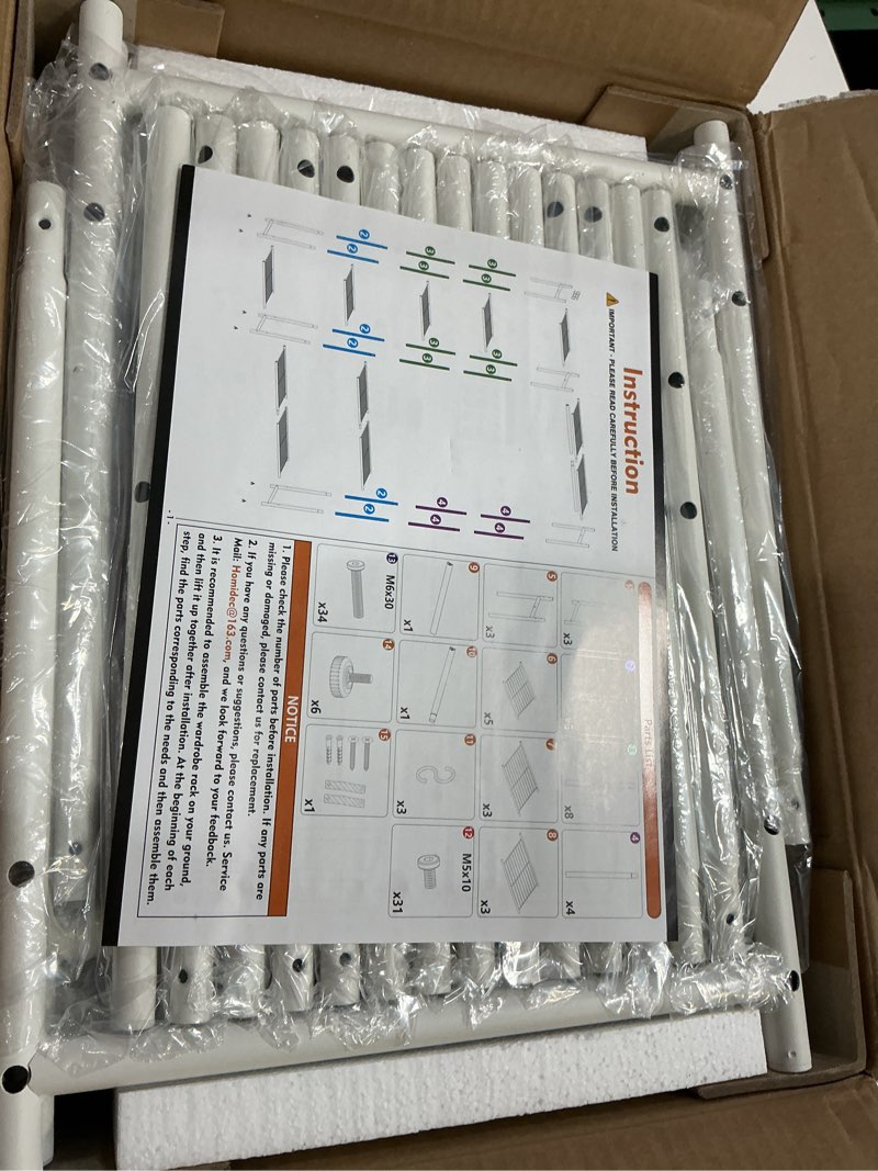 Condition photo showing Good Condition for Wardrobe Closet,Portable Clothes Rack with 4 Tiers Shelves,Freestanding Closet Organizers and Storage System with Hanging Rods,Steel Clothing Rack Suitable for Cloakrooms,Bedrooms,Entrances,etc.White