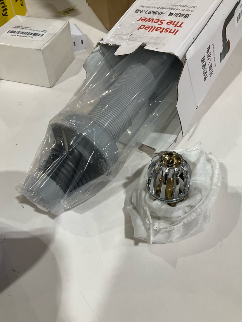 Condition photo showing As Is for Bathroom Sink Drain Kit with Flexible Expandable Pipe: Odor-Free & Backflow-Preventing, Space-Saving Design without a P-trap, For 1-1/4'' & 1-1/2'' Drain Hole (Gold, With Overflow) Gold With Overflow