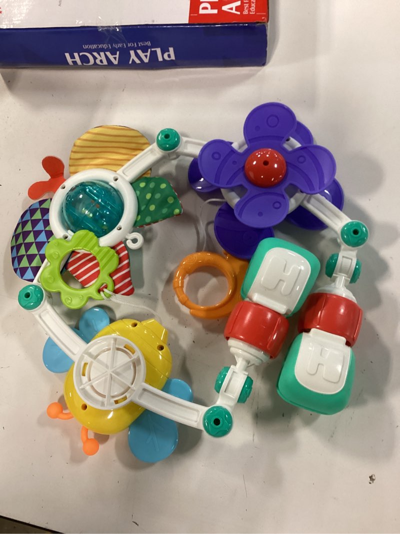 Condition photo showing As Is for baby activity arch toy bar for stroller, bassinets and car seat, adjustable crib toys hanging attachment, sensory development toys with rattles colorful