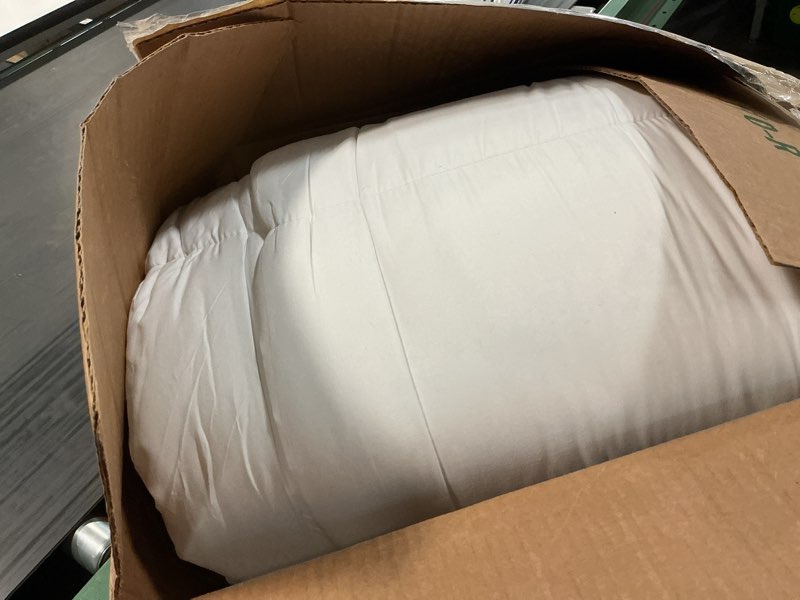 Condition photo showing As Is for amazon basics white down alternative comforter and duvet insert with corner tabs, machine washable, king, light white king light