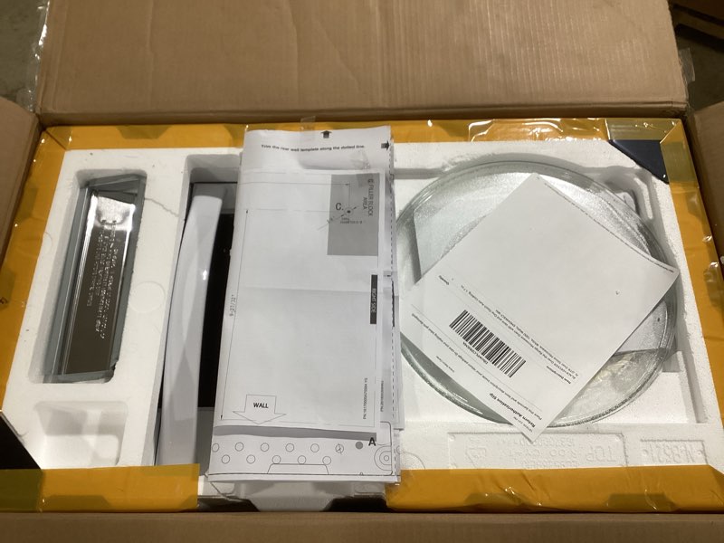 Condition photo showing As Is for BLACK+DECKER Over the Range Microwave Oven with Vent and One-Touch Auto Cooking, 1.7 cu. ft. OTR Over Stove Microwave, White, 1000 Watts, EM044K6CF-WH OTR 1.7 Cu.Ft_White