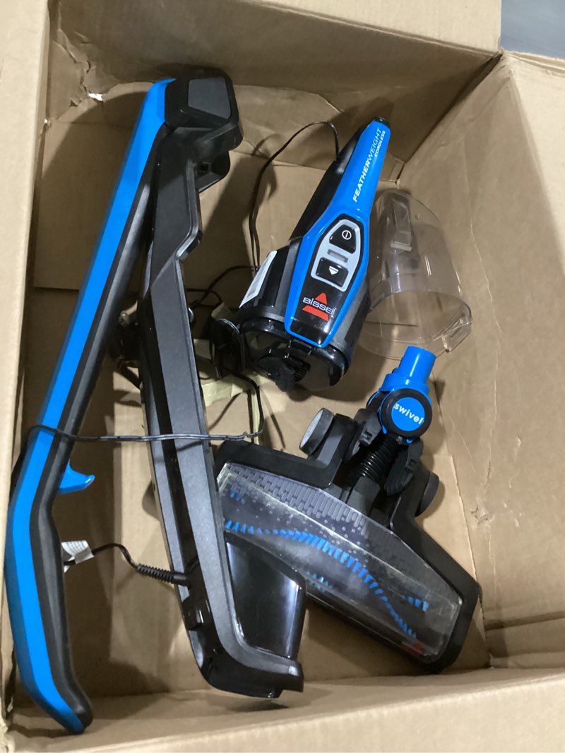 Condition photo showing As Is for bissell, 3061 featherweight cordless stick vacuum, self-standing, electric blue, black