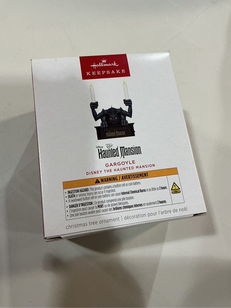 Condition photo showing New/Like New for hallmark keepsake disney christmas ornament, the haunted mansion gargoyle with light, gifts for disney fans