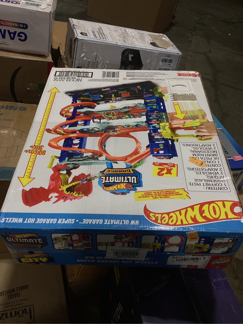 Condition photo showing Good Condition for hot wheels city ultimate garage track set with 2 die-cast toy cars & car-eating dragon, stores 50+ vehicles, 4 levels