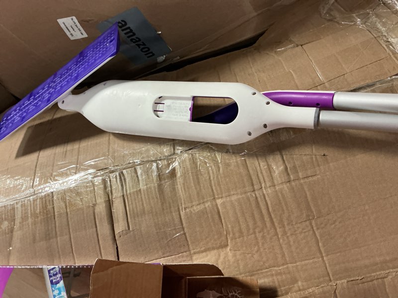 Condition photo showing As Is for swiffer powermop multi-surface mop kit for floor cleaning, fresh scent, mopping kit includes powermop, 2 mopping pad refills, 1 floor cleaning solution with fresh scent and 2 batteries purple and white