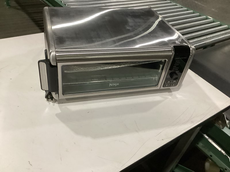 Condition photo showing Good Condition for Ninja Digital Air Fry Countertop Oven, 8-in-1 Functionality, 1800W, Flip-Up Design, XL Capacity, Air Fry Basket, Wire Rack & Crumb Tray, Silver, SP101 8-in-1 Flip Oven