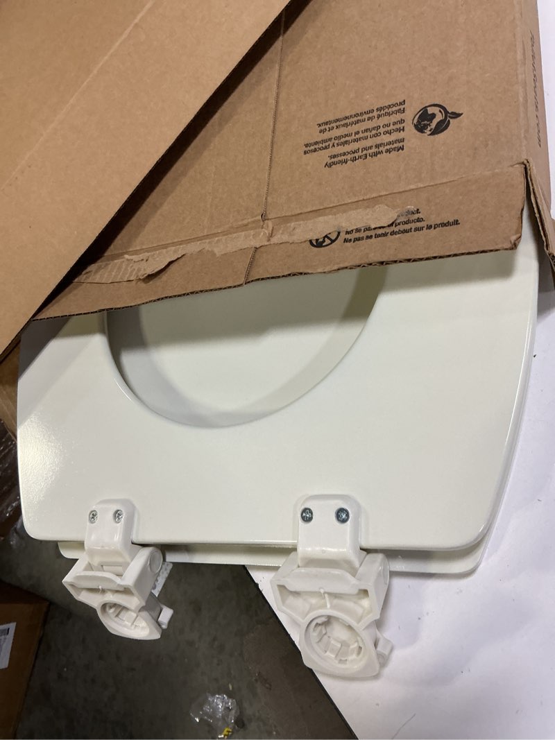 Condition photo showing Good Condition for bemis elongated enameled wood toilet seat in biscuit with easy•clean? hinge