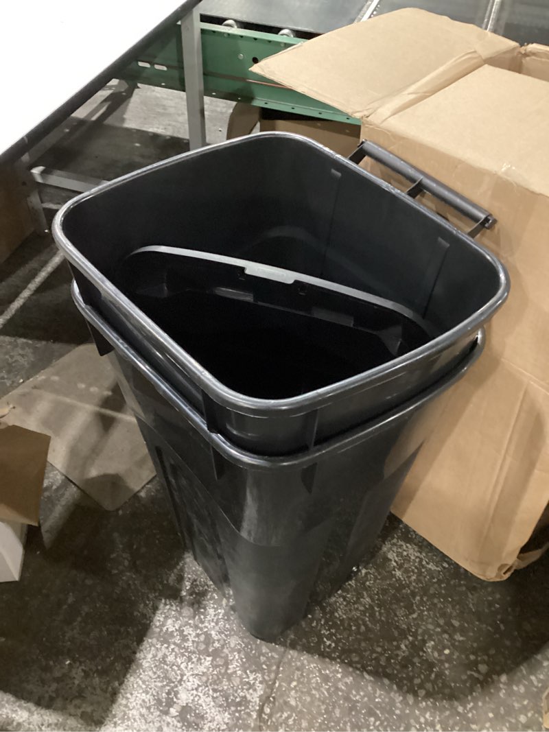 Condition photo showing New/Like New for united solutions 32 gallon wheeled outdoor garbage can with attached snap lock lid and heavy-duty handles, black, heavy-duty construction, perfect backyard, deck, or garage trash can, 2 pack black 32 gallon - 2 pack wheeled garbage can