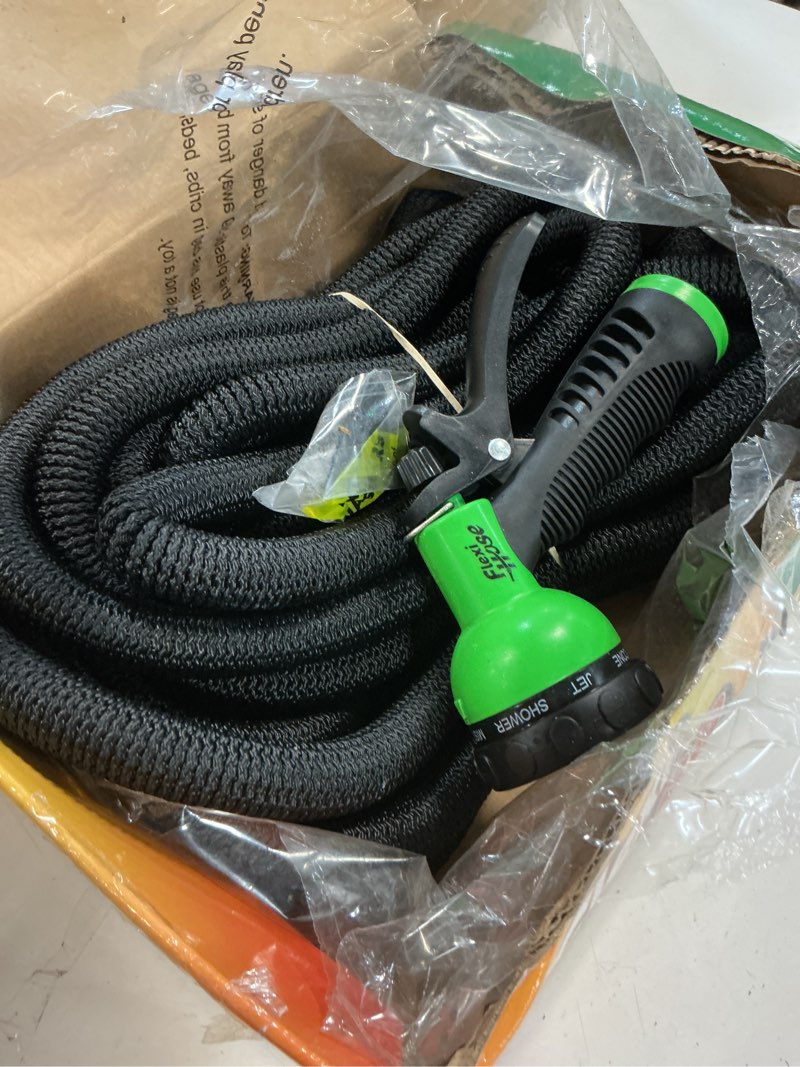 Condition photo showing As Is for Flexi Hose Expandable Garden Hose with 8 Function Nozzle, 100FT - Lightweight Retractable Garden Hose, Water Hose - No-Kink Flexibility, 3/4 Inch Solid Brass Fittings and Double Latex Core 100ft Black