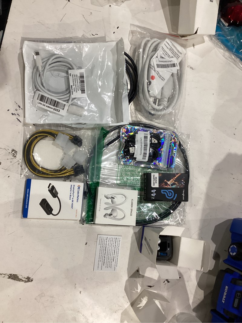 Condition photo showing As Is for assorted lot of electronics (headphones, small gadgets, headsets, etc.) 
