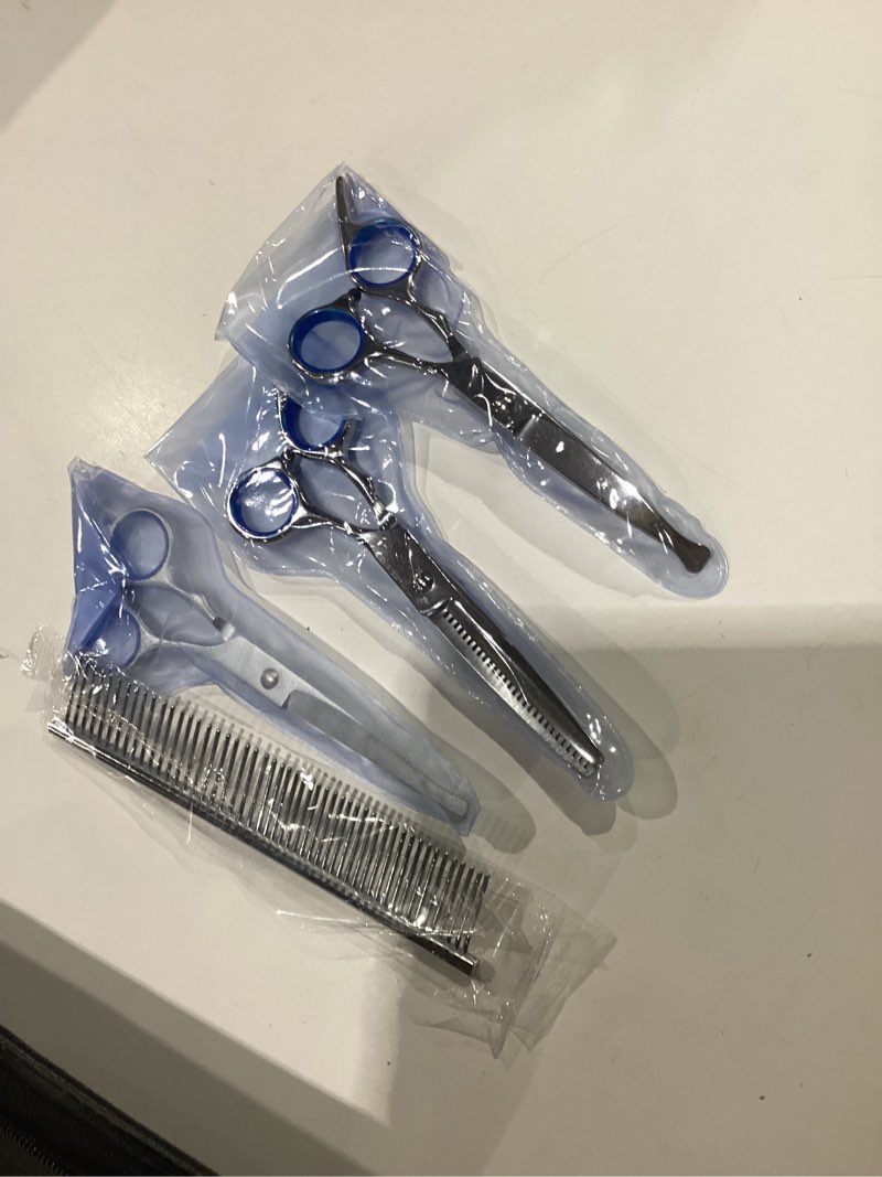 Condition photo showing Good Condition for gladog professional 5 in 1 dog grooming scissors set with safety round tips, sharp and heavy-duty pet grooming shears for cats blue 5 in 1