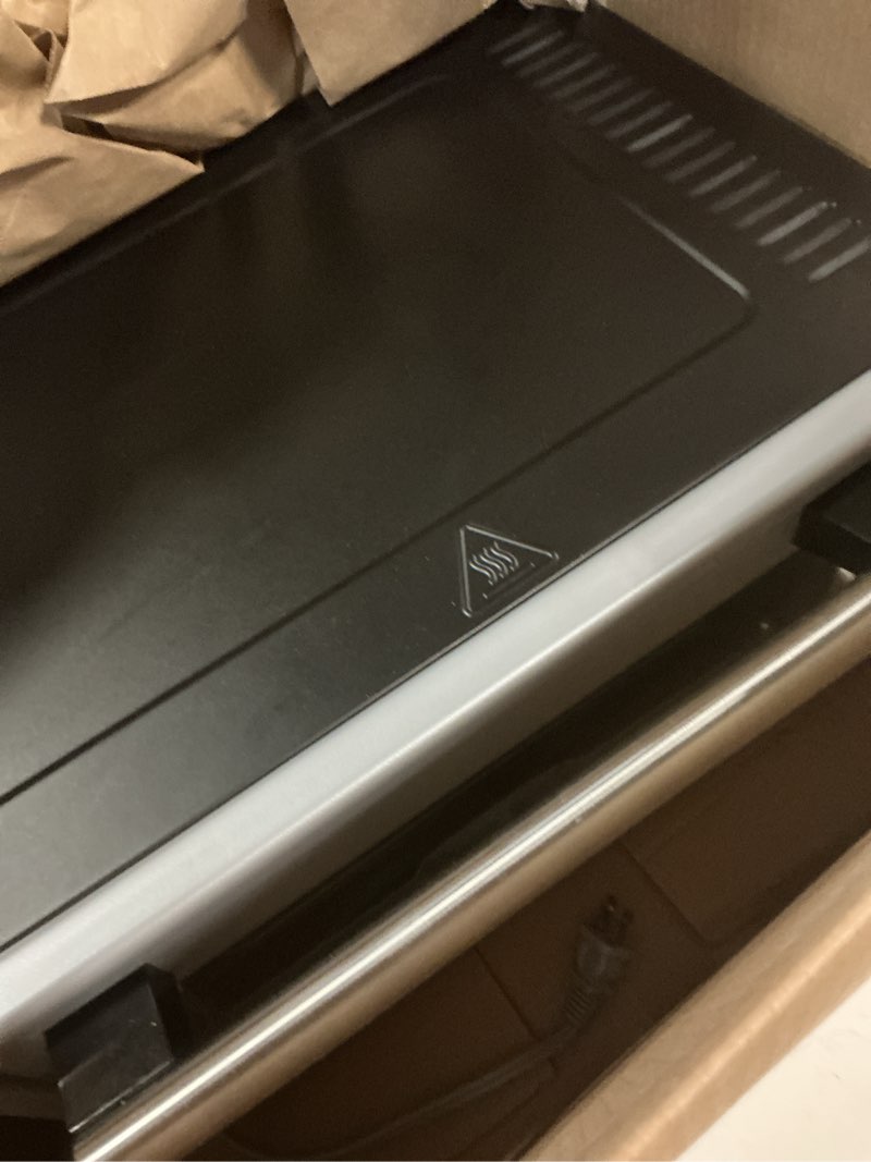 Condition photo showing Good Condition for amazon basics 6-slice 23-qt toaster oven with built-in air fryer, 7-in-1 cooking options, 60-min timer & adjustable temperature (200°f - 450°f), with accessories, 1500w, stainless steel, silver/gray