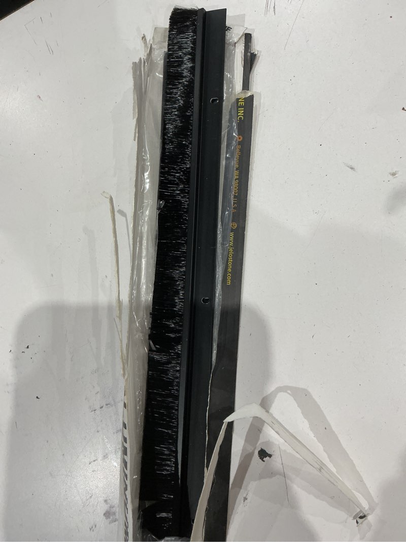 Condition photo showing As Is for (only 1)2 pack - 36'' commercial aluminum door sweep with nylon brush seal(matte black anodized) for gaps up to 1’’, ul fire-rated, uv stable, dependable, long-lasting and cost effective, js-nb181 matte black anodized 36''