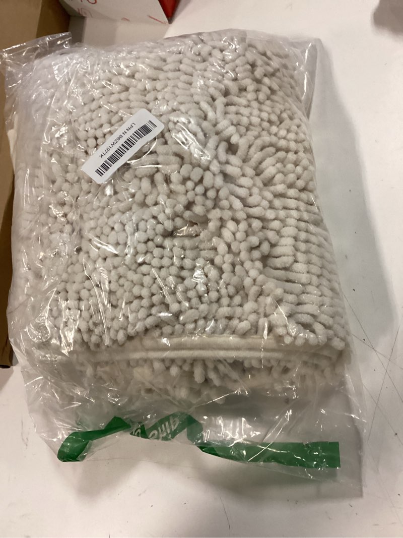 Condition photo showing New/Like New for OLANLY Bathroom Rugs 30x20, Extra Soft Absorbent Chenille Bath Rugs, Rubber Backing Quick Dry, Machine Washable Bath Mats for Bathroom Floor, Tub and Shower, Home Decor Accessories, Ivory 30" x 20" Ivory