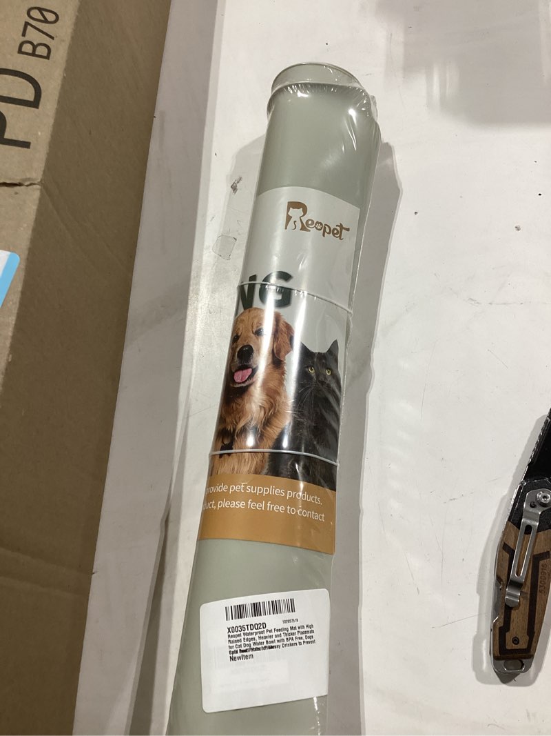 Condition photo showing New/Like New for waterproof pet feeding mat with high raised edges, heavier and thicker placemats for cat dog water bowl with bpa free, dogs cats food mats for messy drinkers to prevent spill and protect floors 28" x 18" beige
