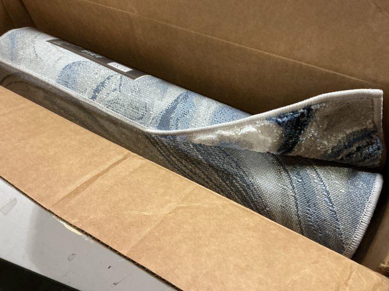 Condition photo showing New/Like New for LUXE WEAVERS Marble Collection 497 Blue 2x7 Abstract Marble Swirl Area Rug 2'1" x 7'5" (Rectangular) Blue