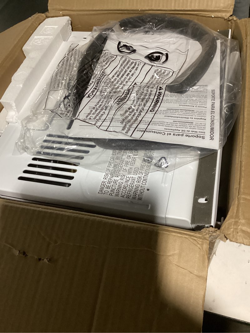 Condition photo showing As Is for ge window air conditioner unit, 5,000 btu for small rooms up to 150 sq ft. with manual adjustable fan and cooling settings, perfect for small bedroom or living room, easy install kit included, white new 5,000 btu mechanical controls white