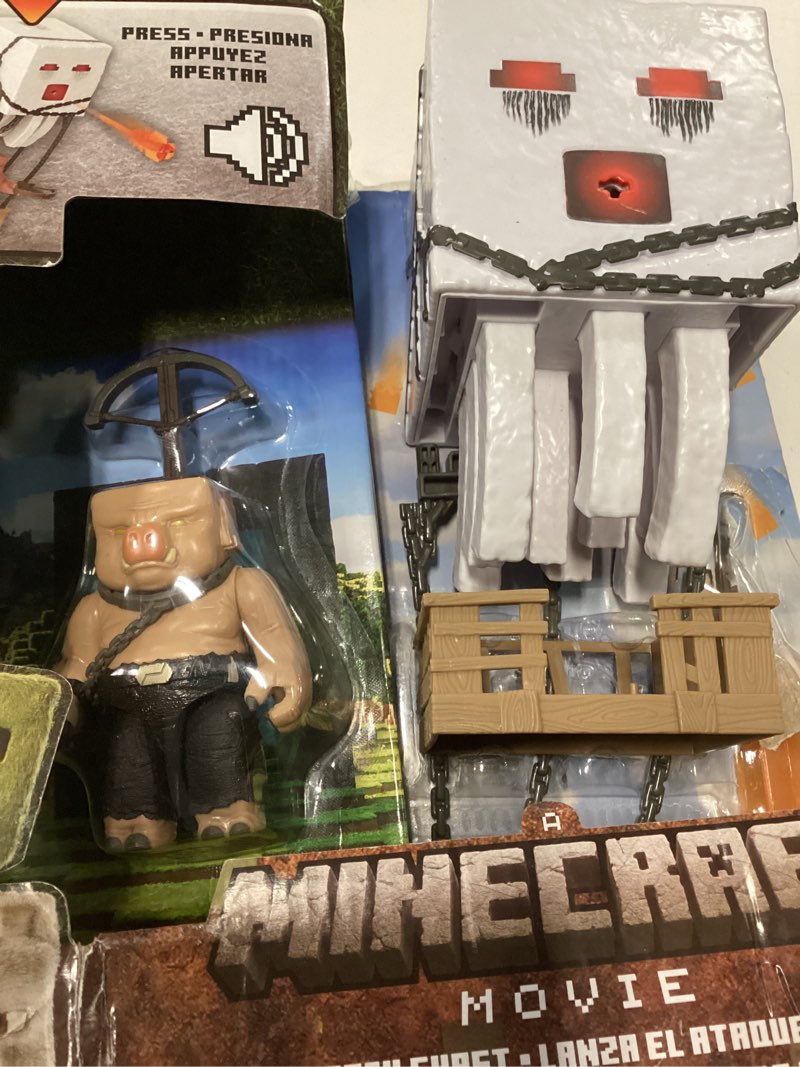 Condition photo showing Good Condition for mattel minecraft action figure set, blast attack ghast with lights, sounds, launcher & projectile, plus piglin warrior inspired by the movie