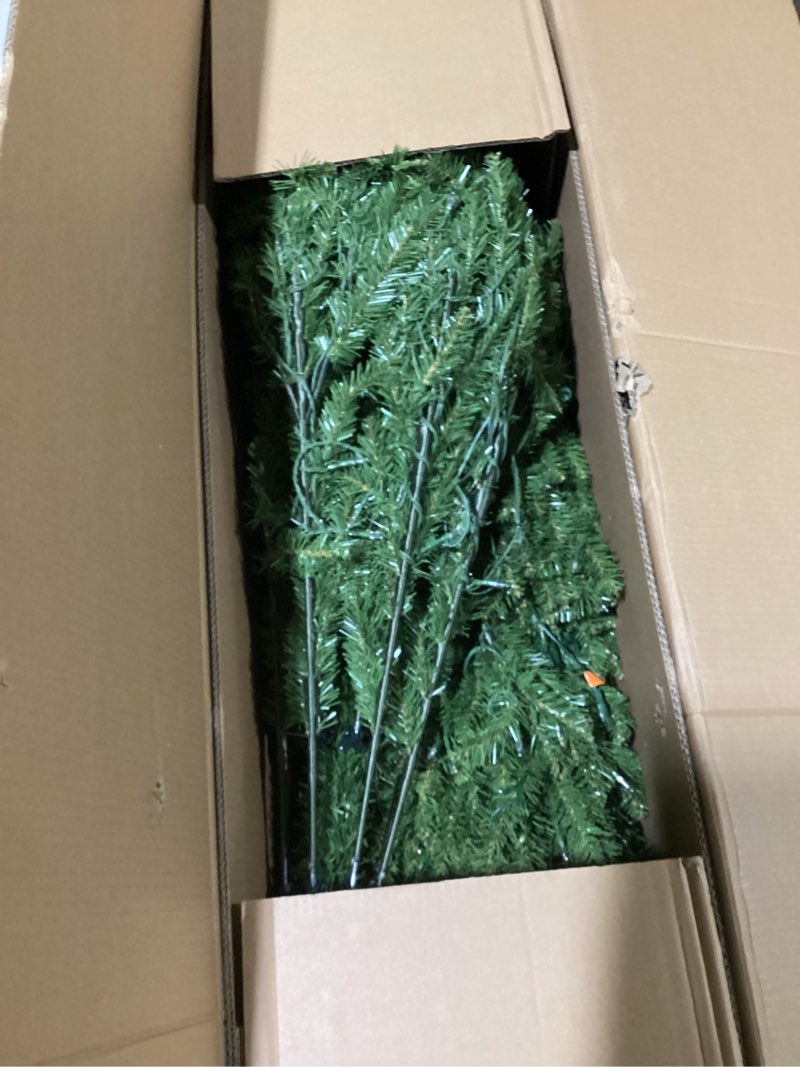 Condition photo showing As Is for National Tree Company 7.5 ft Pre-Lit Dunhill Fir Artificial Christmas Tree, 700 LED Lights, 2,514 Tips, Foot Pedal, 10 Light Functions, Includes Stand, Green