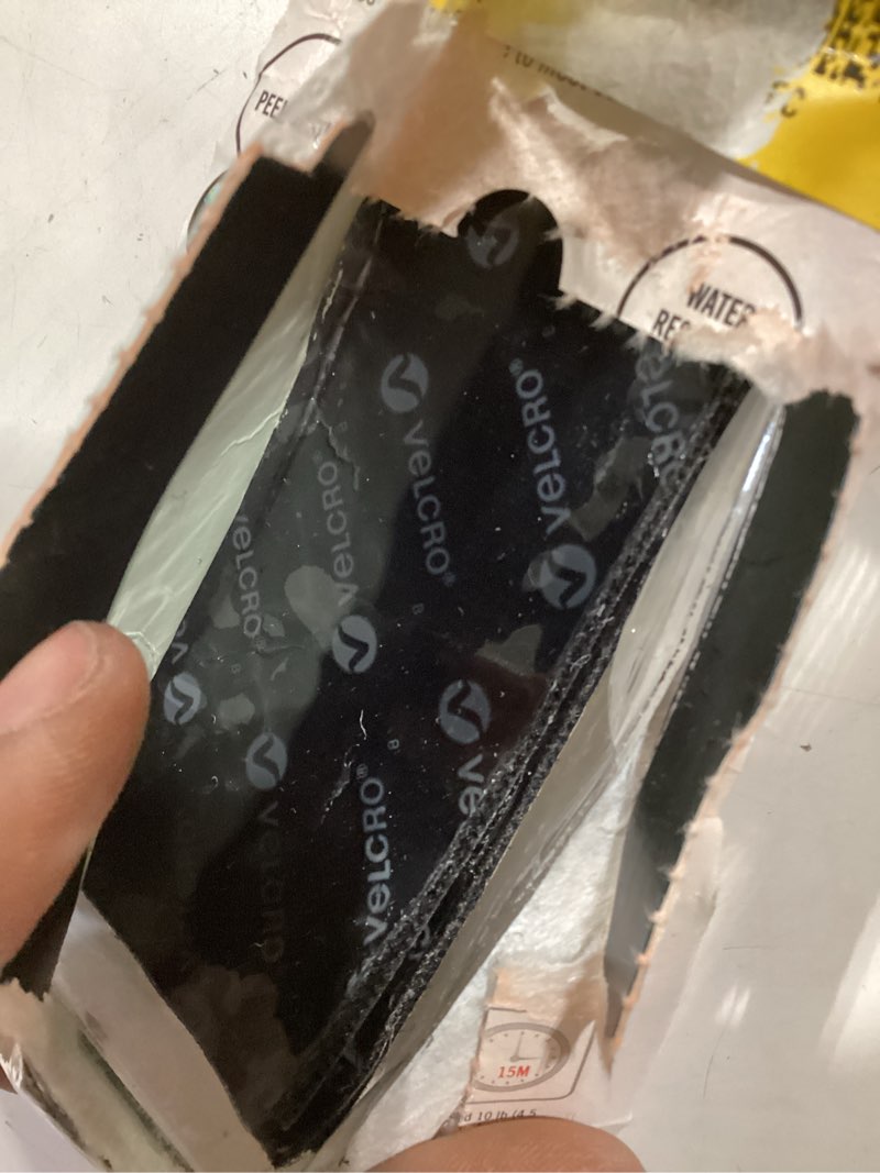 Condition photo showing Good Condition for 4 in. x 2 in. industrial strength strips in black (2-pack)