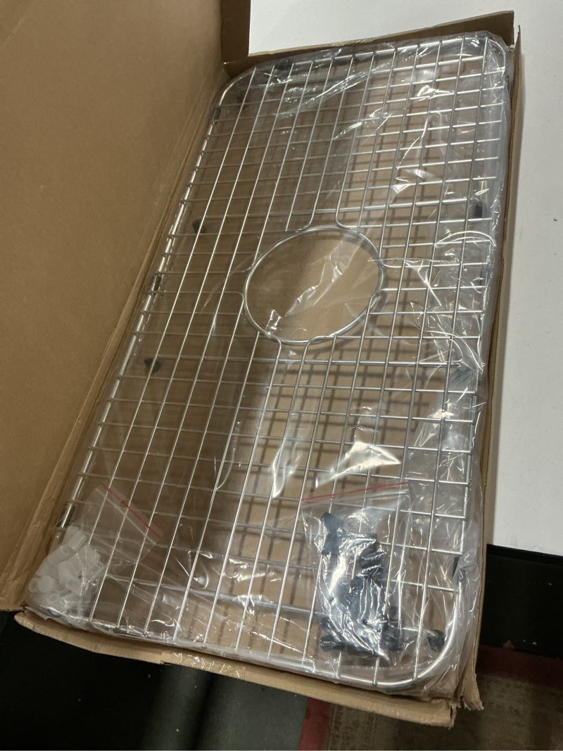 Condition photo showing Good Condition for Serene Valley Sink Bottom Grid 25-1/8" x 12-7/8", Centered Drain with Corner Radius 1-1/2", Sink Grid Stainless Steel NDG2513C