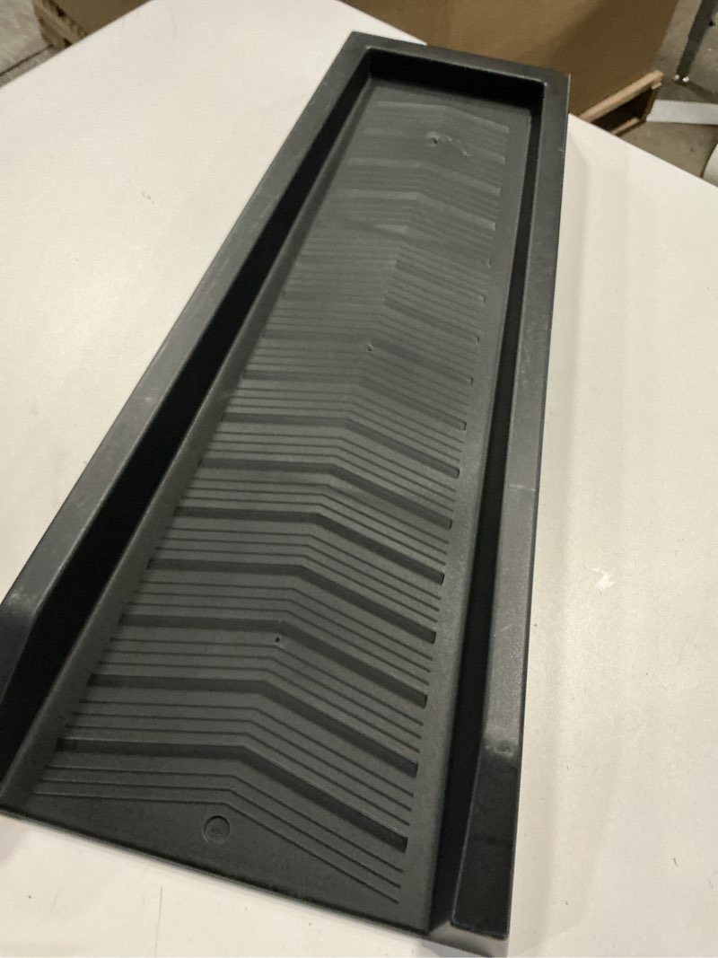 Condition photo showing As Is for spectra splash block- black vinyl 24-in black splash block