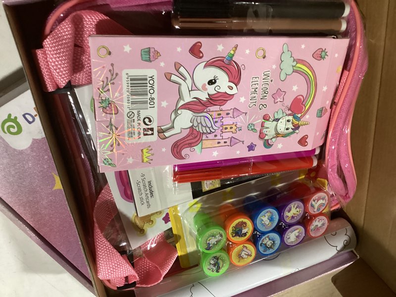 Condition photo showing Good Condition for D-FantiX Unicorn Art Supplies Clear Backpack for Toddler, 51Pcs DIY Coloring Craft Kits with Scratch Art Paper and Stickers, Road Trip Activities for Kids, Creative Birthday Gift for Girls