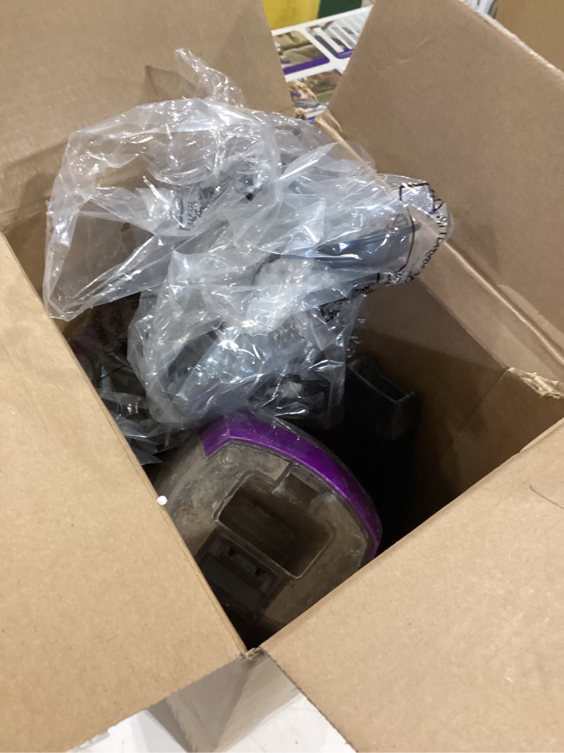 Condition photo showing As Is for bissell pet hair eraser lithium ion cordless hand vacuum  purple  2390a