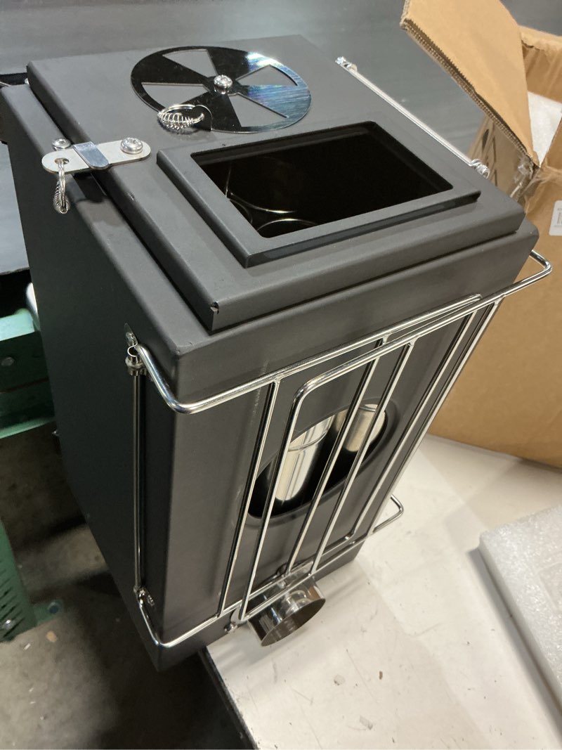 Condition photo showing As Is for Outdoor Wood Burning Stove