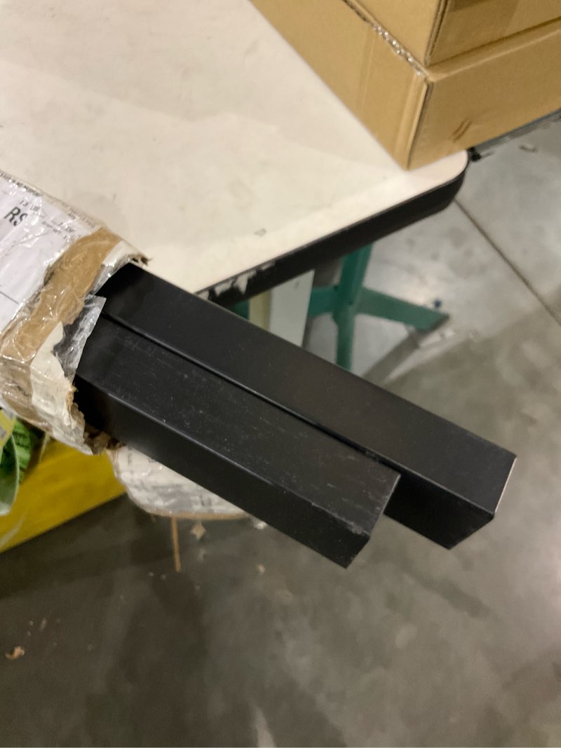 Long black metal pole