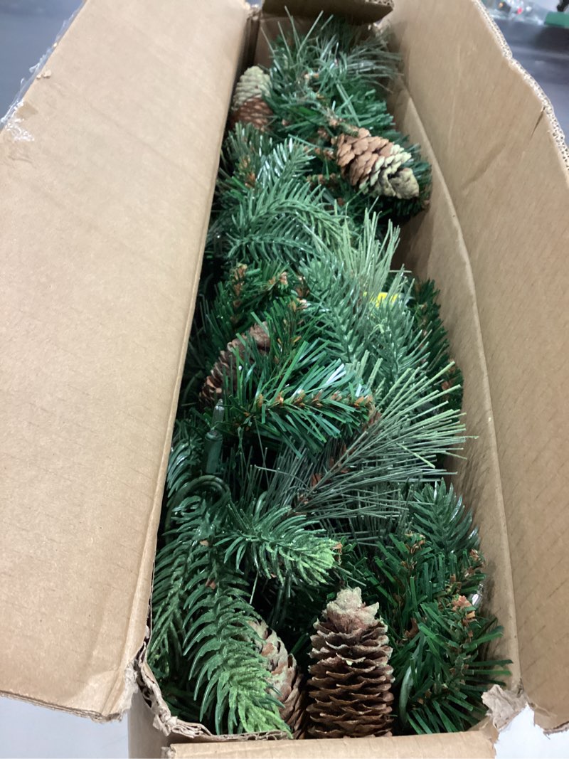 Condition photo showing Good Condition for National Tree Company 9 ft Pre-Lit Carolina Pine Artificial Christmas Garland, Christmas Decoration with Pinecones, 100 Clear Lights, 240 Tips, Green 100 Lights Tree