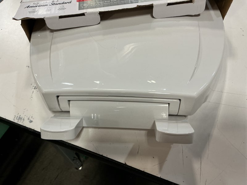 Condition photo showing As Is for american standard mightytuff plastic white elongated soft close toilet seat