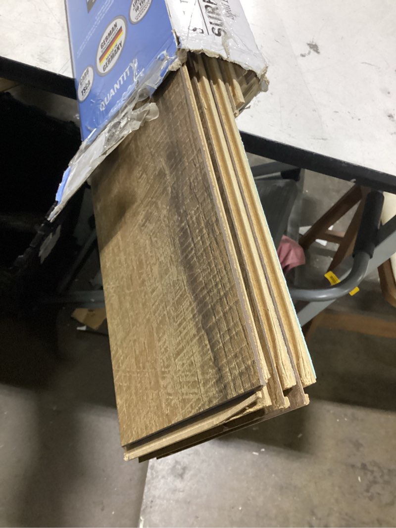 Condition photo showing Good Condition for select surfaces barnwood spilldefense laminate flooring, 12.34 sq. ft. per box
